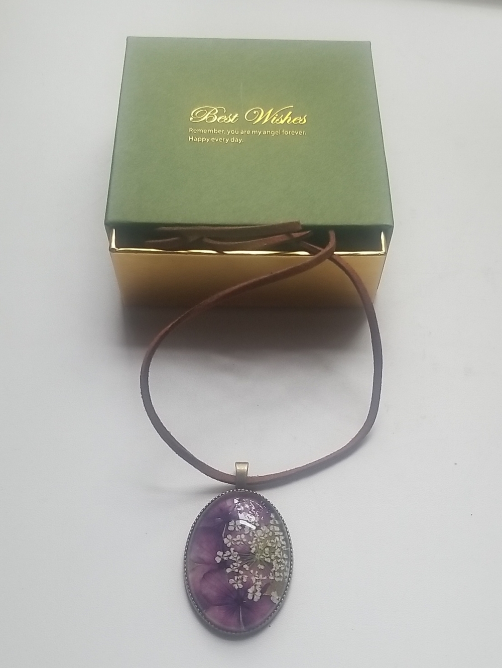 Purple Floral Oval Pendant Necklace on Brown Cord